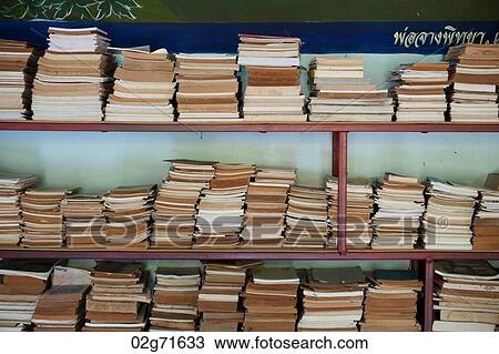 Books in a shelf in Wat Chong Kham temple, Mae Hong Son Province, Thailand View Large Photo Image Stock Image - Books in a shelf in Wat Chong Kham temple, Mae Hong Son Province, Thailand. Fotosearch