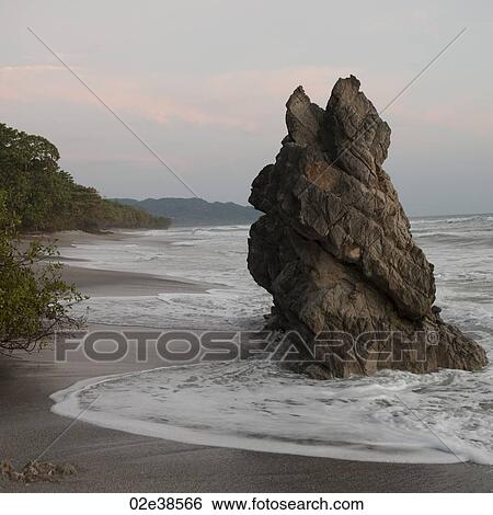 Boulder along shoreline in Costa Rica View Large Photo Image Stock Photograph - Boulder along shoreline in Costa Rica. Fotosearch