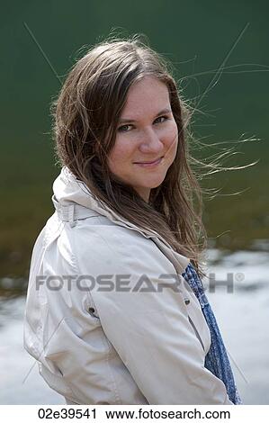 Brunette teenage girl looking at the camera on location in Iceland View Large Photo Image Stock Image - Brunette teenage girl looking at the camera on location in Iceland. Fotosearch