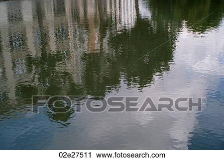 Stock Image - Building reflection in Paris France. Fotosearch