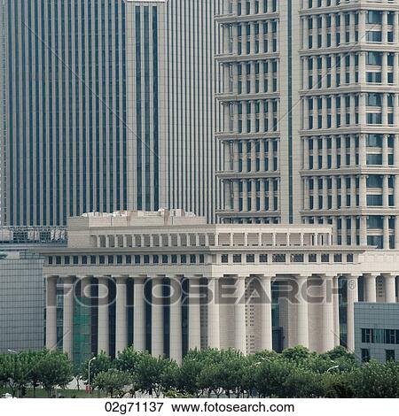 Buildings in a city, Pudong, Shanghai, China View Large Photo Image Stock Photo - Buildings in a city, Pudong, Shanghai, China. Fotosearch