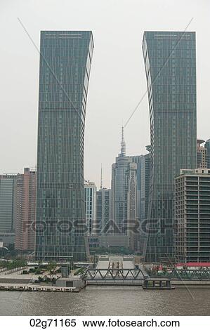 Buildings in a city, Pudong, Shanghai, China View Large Photo Image Stock Photography - Buildings in a city, Pudong, Shanghai, China. Fotosearch