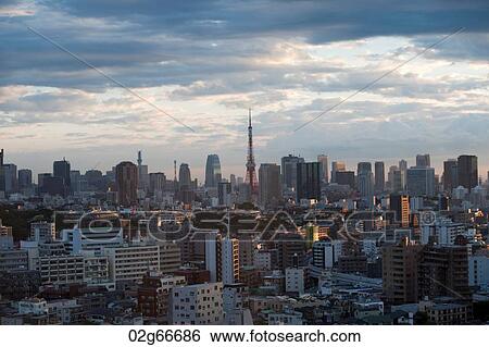 Buildings in a city with Tokyo Tower in the background, Tokyo, Japan View Large Photo Image Stock Photograph - Buildings in a city with Tokyo Tower in the background, Tokyo, Japan. Fotosearch