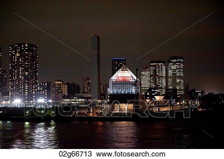 Buildings lit up at night at Port of Tokyo, Tokyo, Japan View Large Photo Image Stock Image - Buildings lit up at night at Port of Tokyo, Tokyo, Japan. Fotosearch