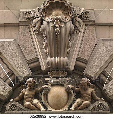 Stock Image - Carved churebs on facade of a building in Manhattan, New York City, U. S. A.. Fotosearch