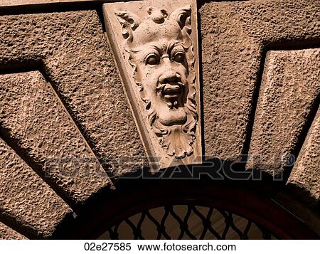 Carved face on entrance to Piazza del Popolo in Rome View Large Photo Image Stock Photography - Carved face on entrance to Piazza del Popolo in Rome. Fotosearch