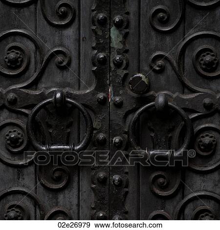 Carvings on exterior door of a building in Manhattan, New York City, U. S. A. View Large Photo Image Stock Photo - Carvings on exterior door of a building in Manhattan, New York City, U. S. A.. Fotosearch