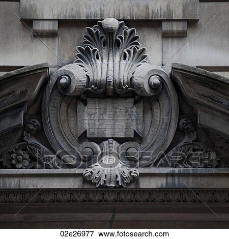 Carvings on the exterior of a building in Manhattan, New York City, U. S. A. View Large Photo Image Stock Photo - Carvings on the exterior of a building in Manhattan, New York City, U. S. A.. Fotosearch