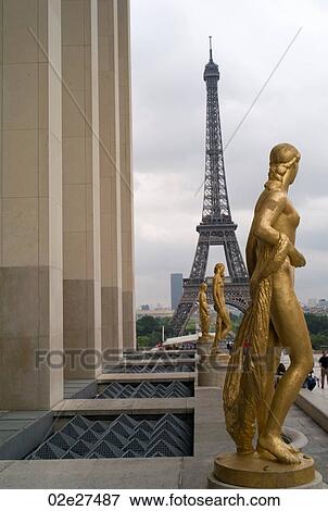 Chaillot Palace Gilded Statues and Eiffel Tower in Paris France View Large Photo Image Stock Photo - Chaillot Palace Gilded Statues and Eiffel Tower in Paris France. Fotosearch