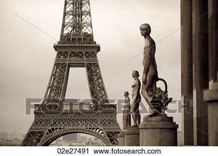 Stock Image - Chaillot Palace Statues and Eiffel Tower in Paris France. Fotosearch