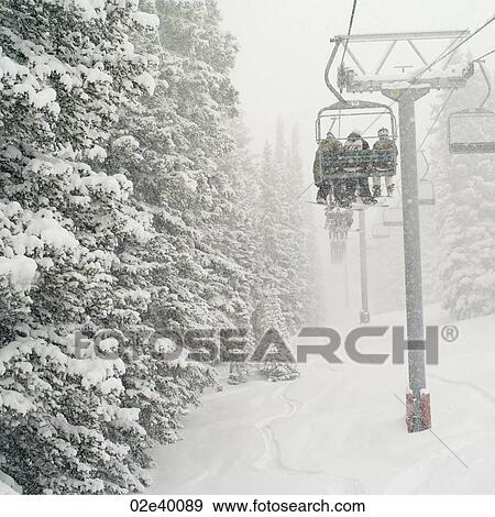 Stock Photo - Chairlift on a ski slope in Vail, Colorado. Fotosearch
