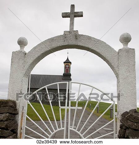 Christian church through iron gate View Large Photo Image Stock Photo - Christian church through iron gate. Fotosearch