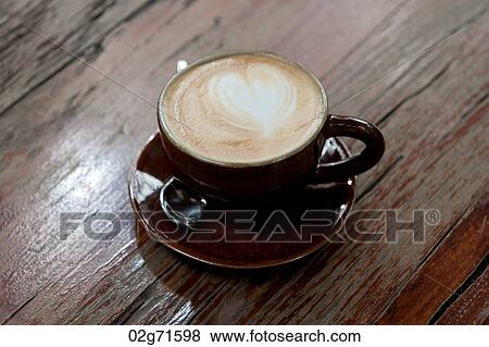 Close-up of a cup of cappuccino, Thailand View Large Photo Image Stock Photo - Close-up of a cup of cappuccino, Thailand. Fotosearch