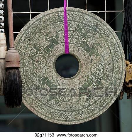 Stock Image - Close-up of a gong, Shanghai, China. Fotosearch