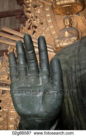 Stock Photo - Close-up of a hand of Buddha statue in Todaiji Temple, Nara, Japan. Fotosearch
