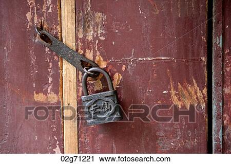 Close-up of a padlock at the door, Zhouzhuang, Jiangsu Province, China View Large Photo Image Stock Image - Close-up of a padlock at the door, Zhouzhuang, Jiangsu Province, China. Fotosearch