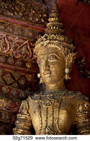 Close-up of a statue at Wat Phra Singh, Chiang Mai, Thailand View Large Photo Image Stock Photo - Close-up of a statue at Wat Phra Singh, Chiang Mai, Thailand. Fotosearch