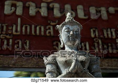 Close-up of a statue of an Apsara at Wat Phra Singh, Chiang Mai, Thailand View Large Photo Image Stock Photo - Close-up of a statue of an Apsara at Wat Phra Singh, Chiang Mai, Thailand. Fotosearch