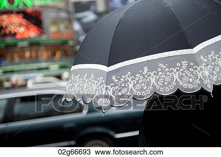 Close-up of lace trimmed umbrella held by a person, Ginza, Chuo Ward, Tokyo, Japan View Large Photo Image Stock Image - Close-up of lace trimmed umbrella held by a person, Ginza, Chuo Ward, Tokyo, Japan. Fotosearch