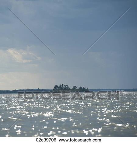 Cloud in the horizon sky over Lake of the Woods, Ontario View Large Photo Image Stock Photograph - Cloud in the horizon sky over Lake of the Woods, Ontario. Fotosearch