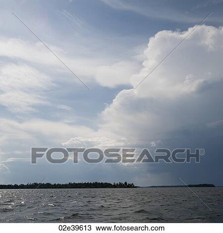 Clouds in the horizon over Lake of the Woods, Ontario View Large Photo Image Stock Image - Clouds in the horizon over Lake of the Woods, Ontario. Fotosearch