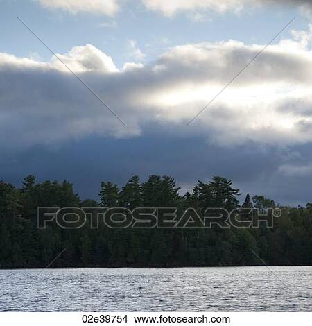 Clouds in the sky over Lake of the Woods, Ontario View Large Photo Image Picture - Clouds in the sky over Lake of the Woods, Ontario. Fotosearch