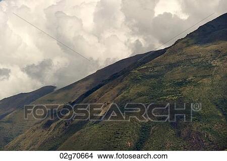 Clouds over a mountain range, Sacred Valley, Cusco Region, Peru View Large Photo Image Picture - Clouds over a mountain range, Sacred Valley, Cusco Region, Peru. Fotosearch