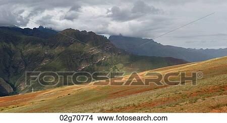 Clouds over a mountain range, Sacred Valley, Cusco Region, Peru View Large Photo Image Picture - Clouds over a mountain range, Sacred Valley, Cusco Region, Peru. Fotosearch