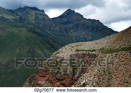 Clouds over a mountain range, Sacred Valley, Cusco Region, Peru View Large Photo Image Stock Photo - Clouds over a mountain range, Sacred Valley, Cusco Region, Peru. Fotosearch
