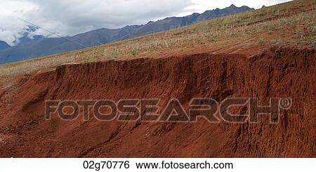 Stock Photograph - Clouds over a mountain range, Sacred Valley, Cusco Region, Peru. Fotosearch
