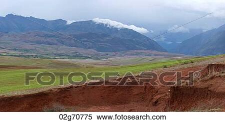 Clouds over a mountain range, Sacred Valley, Cusco Region, Peru View Large Photo Image Stock Photography - Clouds over a mountain range, Sacred Valley, Cusco Region, Peru. Fotosearch