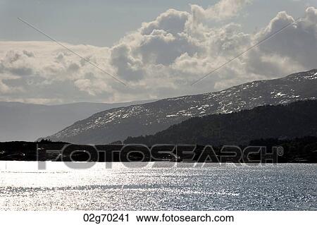 Clouds over mountain range, Sognefjord, Norway View Large Photo Image Stock Image - Clouds over mountain range, Sognefjord, Norway. Fotosearch