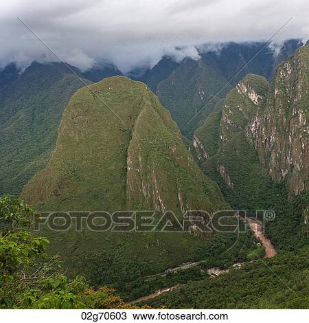 Clouds over mountains, Machu Picchu, Cusco Region, Peru View Large Photo Image Stock Image - Clouds over mountains, Machu Picchu, Cusco Region, Peru. Fotosearch