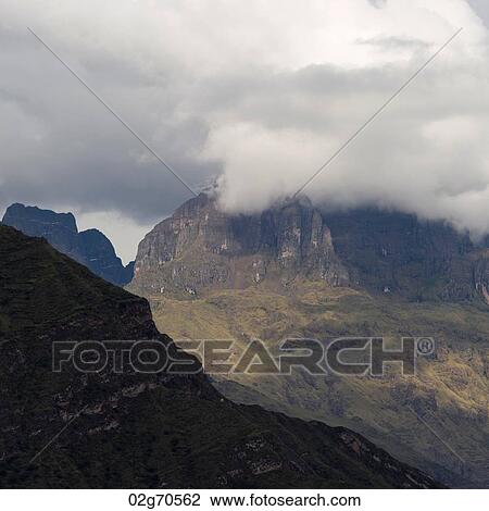 Clouds over mountains, Sacred Valley, Cusco Region, Peru View Large Photo Image Stock Image - Clouds over mountains, Sacred Valley, Cusco Region, Peru. Fotosearch