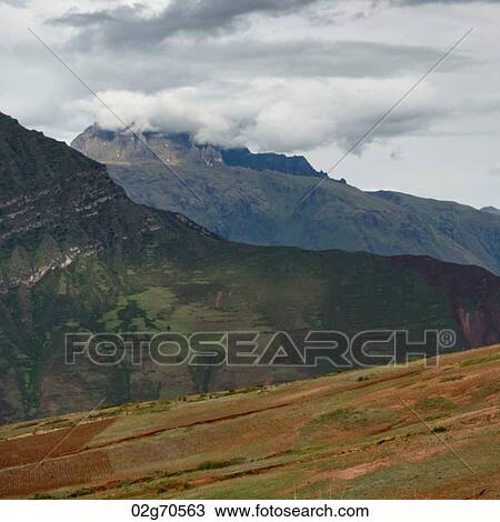 Clouds over mountains, Sacred Valley, Cusco Region, Peru View Large Photo Image Stock Image - Clouds over mountains, Sacred Valley, Cusco Region, Peru. Fotosearch