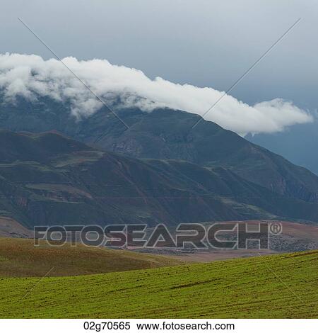 Stock Photography - Clouds over mountains, Sacred Valley, Cusco Region, Peru. Fotosearch