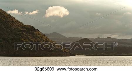Clouds over Mountains, Santiago Island, Galapagos Islands, Ecuador View Large Photo Image Stock Photo - Clouds over Mountains, Santiago Island, Galapagos Islands, Ecuador. Fotosearch
