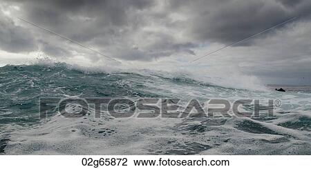 Clouds over the Pacific Ocean, Playa Ochoa, San Cristobal Island, Galapagos Islands, Ecuador View Large Photo Image Stock Image - Clouds over the Pacific Ocean, Playa Ochoa, San Cristobal Island, Galapagos Islands, Ecuador. Fotosearch