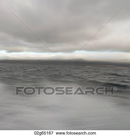 Clouds over the Pacific Ocean, San Cristobal Island, Galapagos Islands, Ecuador View Large Photo Image Stock Photo - Clouds over the Pacific Ocean, San Cristobal Island, Galapagos Islands, Ecuador. Fotosearch