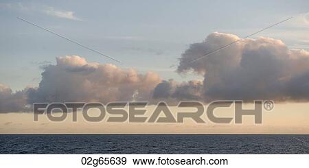 Clouds over the Pacific Ocean, Galapagos Islands, Ecuador View Large Photo Image Stock Photo - Clouds over the Pacific Ocean, Galapagos Islands, Ecuador. Fotosearch