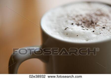Coffee in a mug with milk foam and spices View Large Photo Image Stock Image - Coffee in a mug with milk foam and spices. Fotosearch