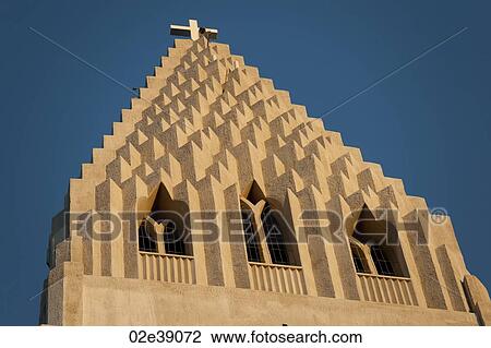 Stock Image - Concrete futuristic Christian church steeple. Fotosearch