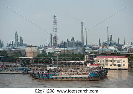 Container ships at a commercial dock, Yangtze River, Shanghai, China View Large Photo Image Stock Photo - Container ships at a commercial dock, Yangtze River, Shanghai, China. Fotosearch
