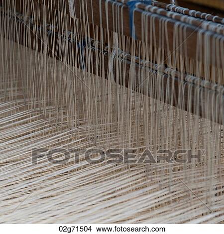 Cotton weaving in a loom, Chiang Mai, Thailand View Large Photo Image Picture - Cotton weaving in a loom, Chiang Mai, Thailand. Fotosearch