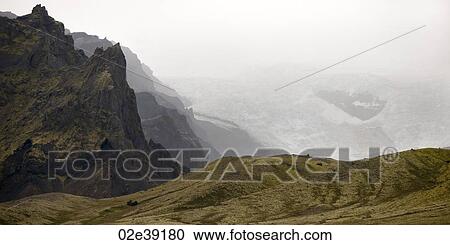 Craggy mountain, misty glacier, rolling hills View Large Photo Image Stock Image - Craggy mountain, misty glacier, rolling hills. Fotosearch