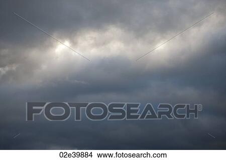 Picture - Dark storm clouds in the sky over Lake of the Woods, Ontario. Fotosearch