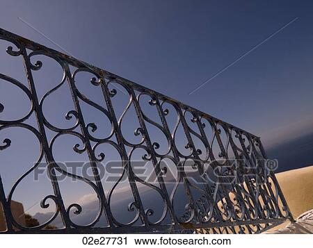 Decorative iron railing in Santorini Greece View Large Photo Image Stock Image - Decorative iron railing in Santorini Greece. Fotosearch