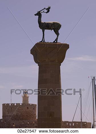 Deer statue at Mandraki Harbour in Rhodes Greece View Large Photo Image Stock Photo - Deer statue at Mandraki Harbour in Rhodes Greece. Fotosearch