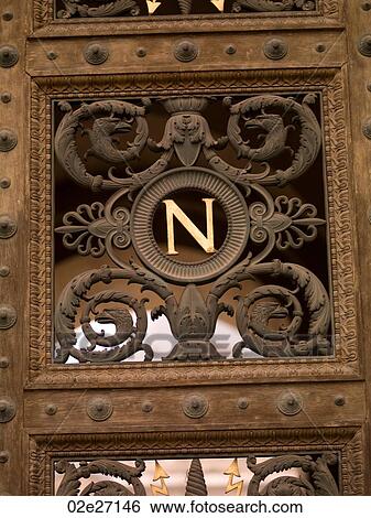 Stock Photograph - Design on doors in Paris France. Fotosearch