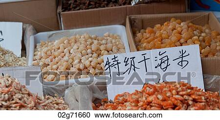 Dried food at a market stall, Binhai, Tianjin, China View Large Photo Image Stock Image - Dried food at a market stall, Binhai, Tianjin, China. Fotosearch